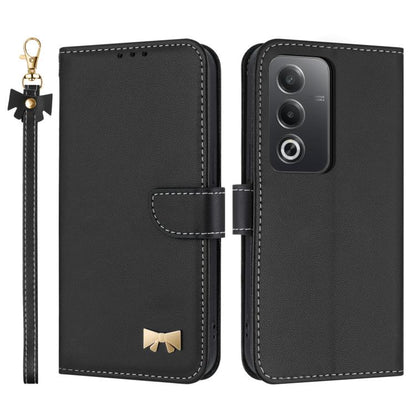 Black leather phone case with hand strap and metal bow charm, camera cutout cover