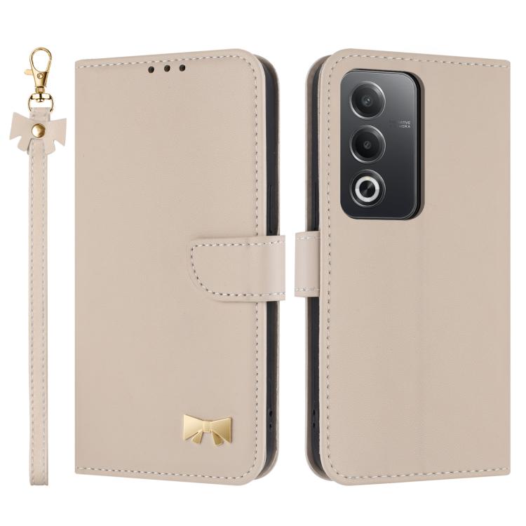 Beige leather phone case with wrist strap and bow charm, folio flap and camera cutout