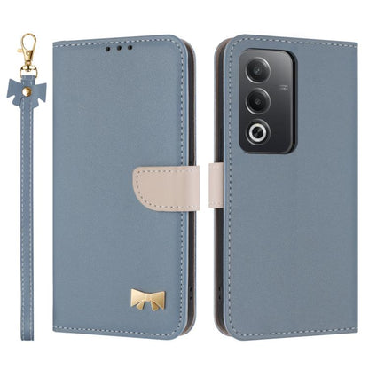 Dark blue leather phone case with wrist strap and bow charm, folio flap and camera cutout