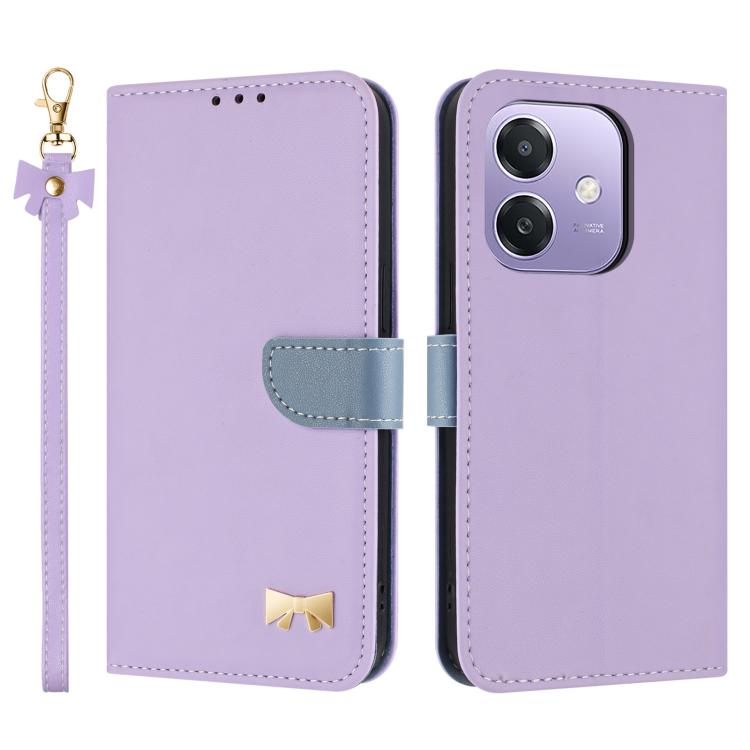 Purple leather phone case with hand strap, folio flap, metal bow charm, card holder.