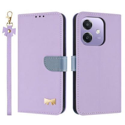 Purple leather phone case with hand strap, folio flap, metal bow charm, card holder.