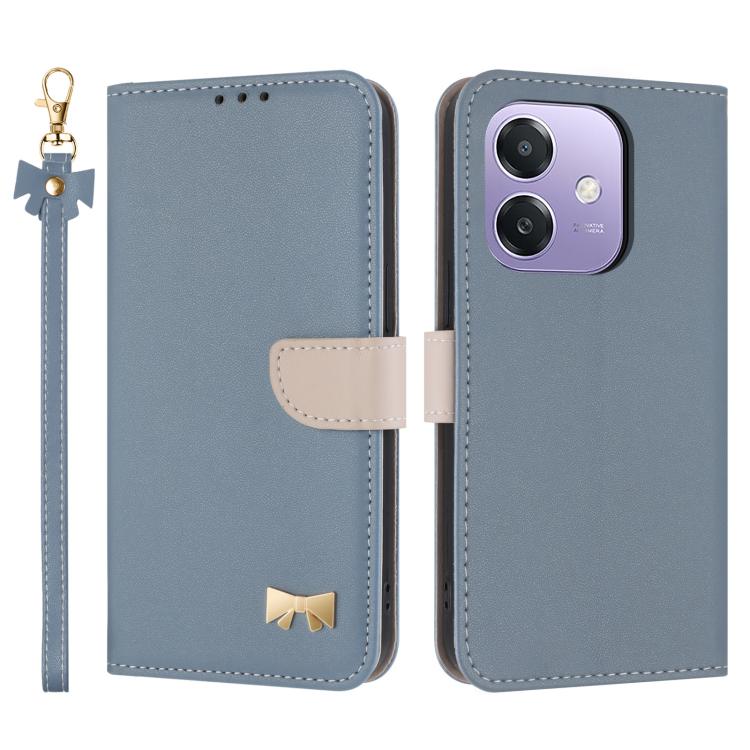 Light blue leather phone case with hand strap, folio flap, metal bow charm, card holder.