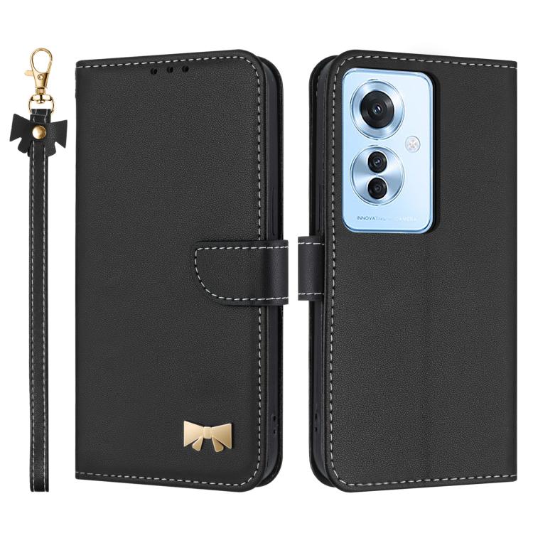 Black leather phone case with wrist strap, flip cover, and gold bow emblem