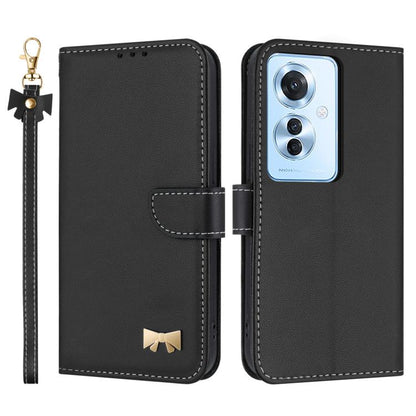 Black leather phone case with wrist strap, flip cover, and gold bow emblem