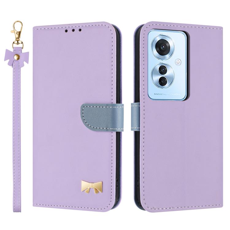 Lilac leather phone case with wrist strap, flip cover, and gold bow badge