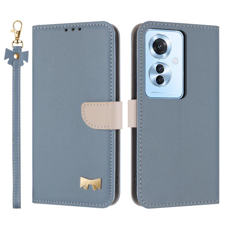 Light blue leather phone case with wrist strap and flip cover, showing camera cutout