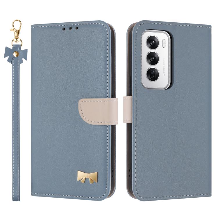 Light blue leather phone case with wrist strap, flip cover, and gold bow badge