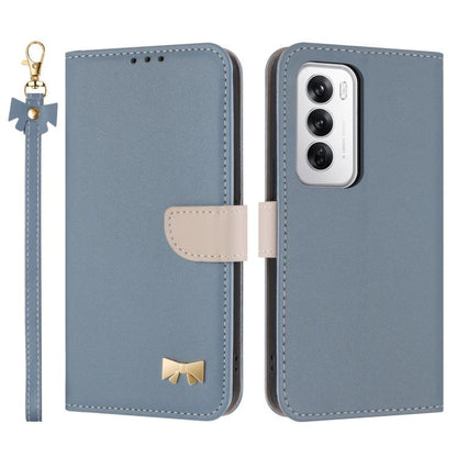 Light blue leather phone case with wrist strap, flip cover, and gold bow badge