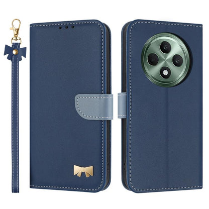 Dark blue leather phone case with hand strap, folio flap, metal bow charm, card holder.