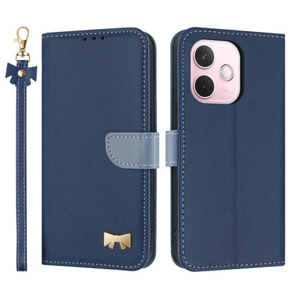 Navy blue leather-style phone case with wrist strap, folio flap, and gold bow emblem