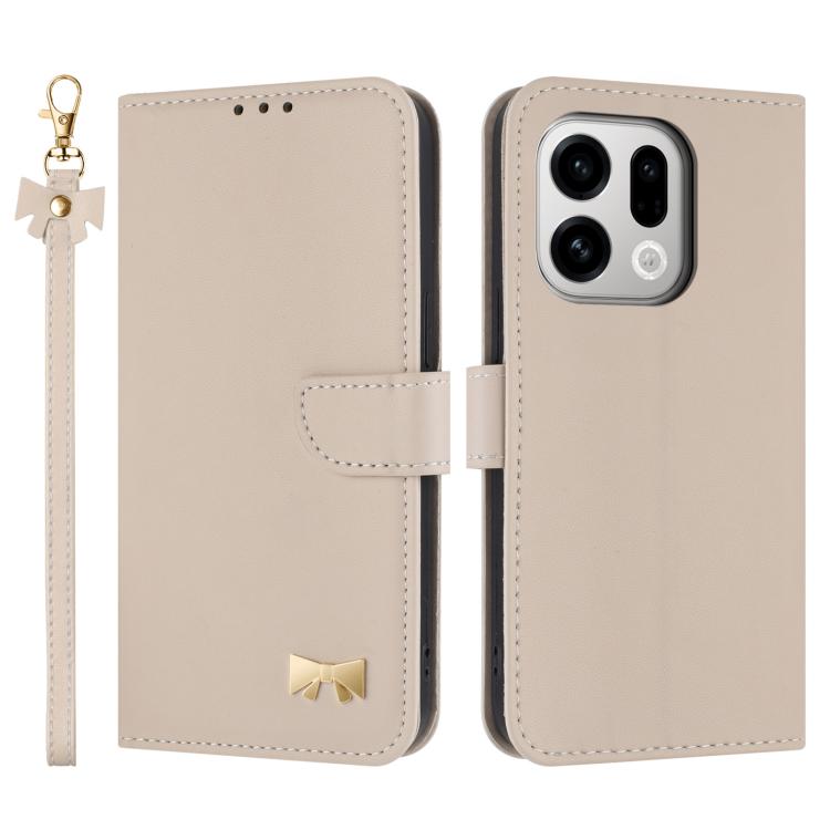 Beige leather folio phone case with metal bow charm and wrist strap, flip cover