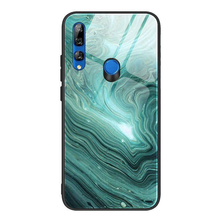 Marble pattern glass phone case with teal swirls, dual camera cutouts, blue button