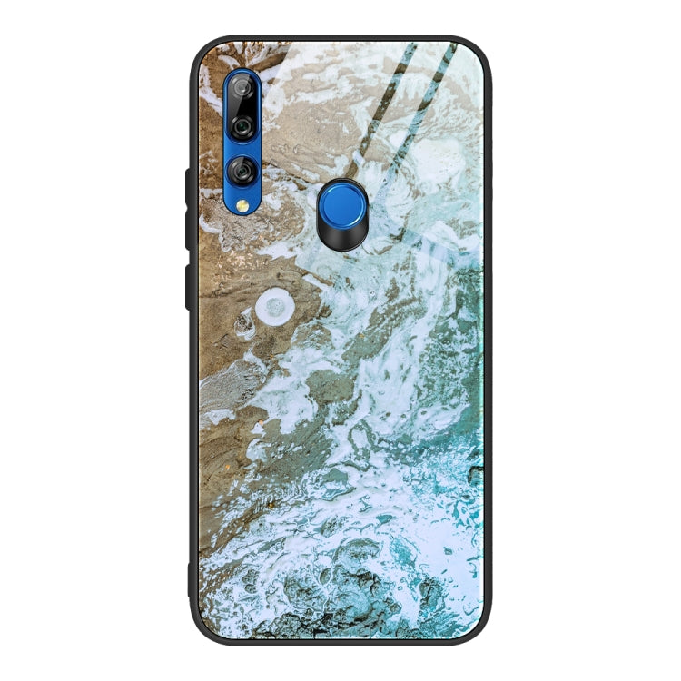 Marble pattern glass phone case with green and gold veined look, dual camera cutouts, blue button