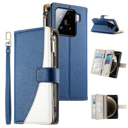 Deep blue textured leather phone wallet case with zipper, card slots, and wrist strap
