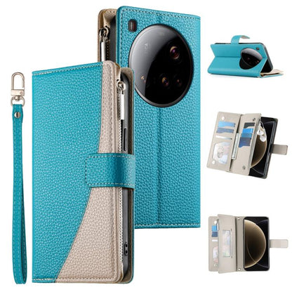 Blue leather phone wallet case with zipper, card slots, and short wrist strap.