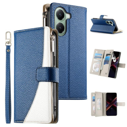 Dark blue leather wallet phone case with zipper, card slots, and wrist strap; white stitched panel