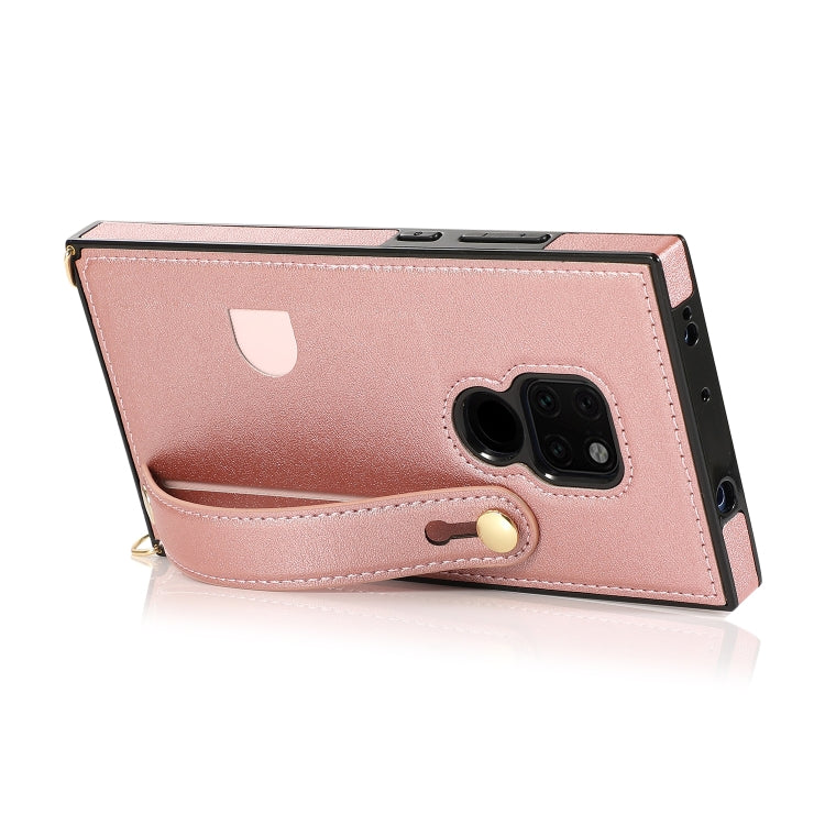Rose gold shockproof folio case with camera cutout, snap strap and raised edges