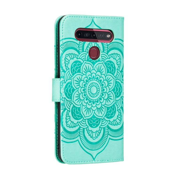 Turquoise mandala embossed PU leather case with open buttoned stand and camera cutout