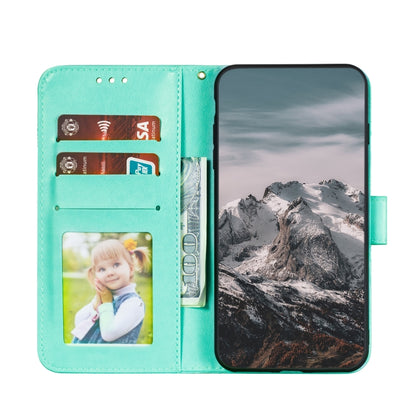 Turquoise wallet-style phone case with card slots, photo window, and flip cover