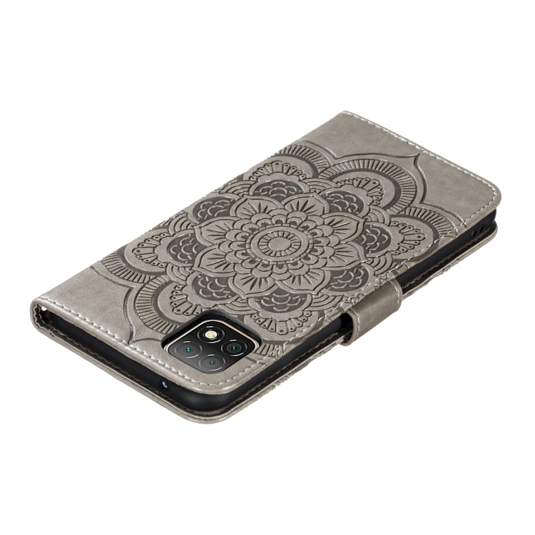 Gray mandala embossed PU leather flip phone case showing back camera opening