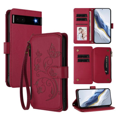 Wine red leather phone wallet case with zipper, embossed floral butterfly design, wrist strap.