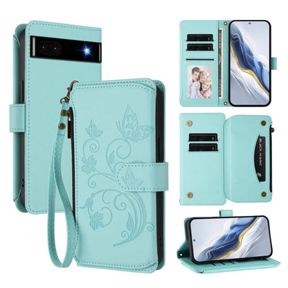 Mint green leather wallet phone case with zipper, multi-card slots, wrist strap, floral emboss.