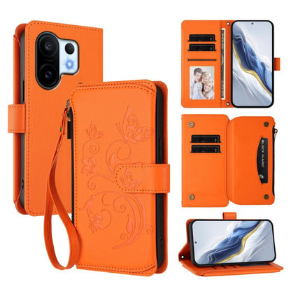 Orange leather wallet phone case with embossed butterfly-flower design and wrist strap, zipper.