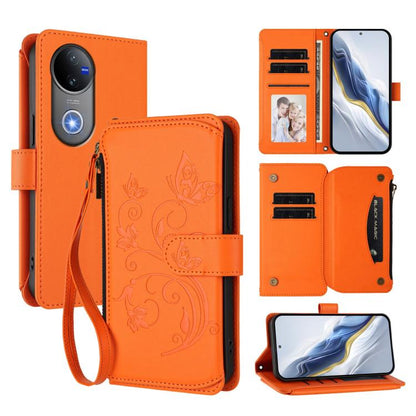 Orange leather wallet phone case with butterfly floral emboss, zipper closure and strap.