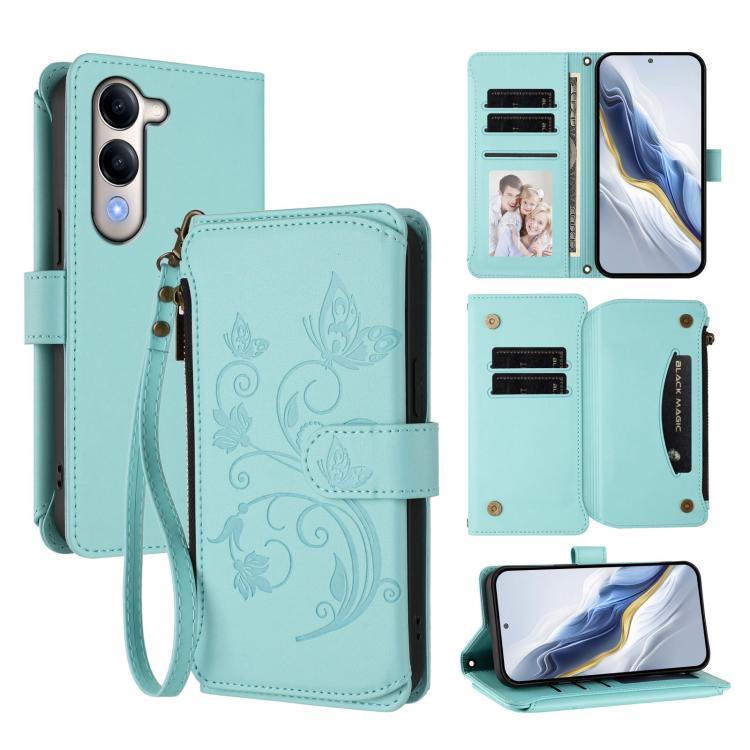 Mint green leather zip-around phone wallet with butterfly flower embossing, card slots, wrist strap.