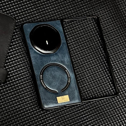 Blue MagSafe magnetic phone case with circular camera opening and ring-shaped Magsafe pad