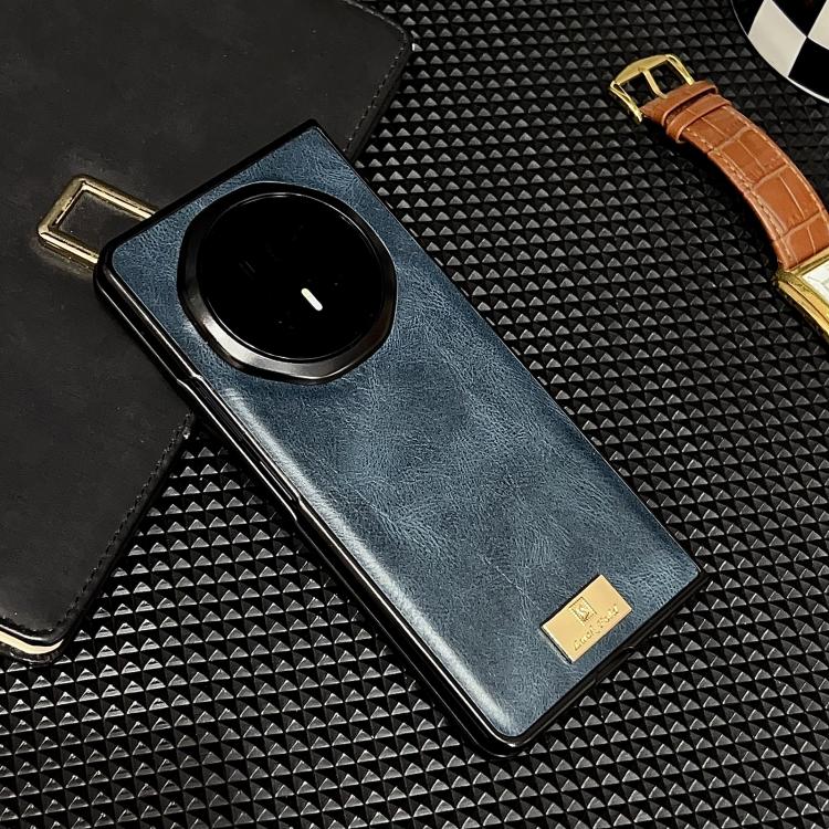 Blue crazy horse texture phone case with black circular camera opening and gold logo patch