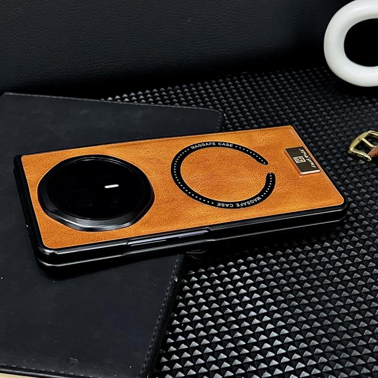 Orange crazy horse texture PU phone case with circular camera opening and wrist/strap grip