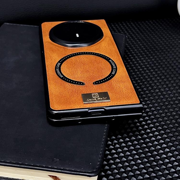 Orange crazy horse texture PU phone case with black camera opening and circular strap grip