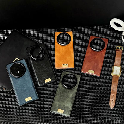 Assorted colors of crazy horse texture PU phone cases with circular camera cutouts and straps