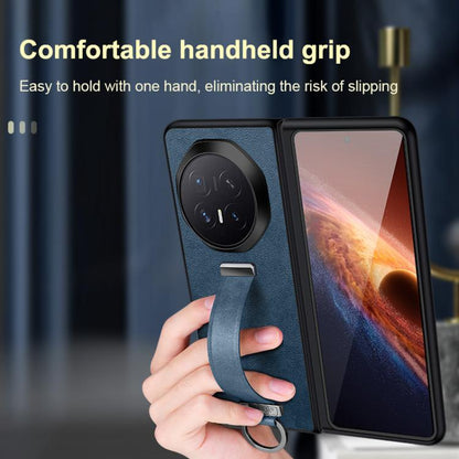 Blue leather-textured phone case with camera cutout and wrist strap ring, held in hand