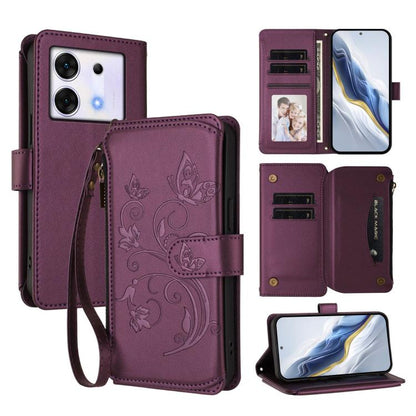 Dark purple leather phone wallet case with wrist strap, floral emboss, multi-card slots and zip pocket.