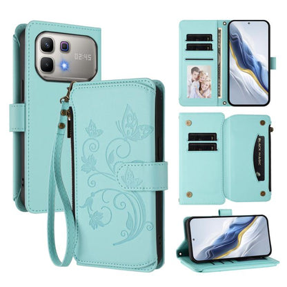 Mint green leather-style zipper wallet phone case with floral butterfly print and wrist strap