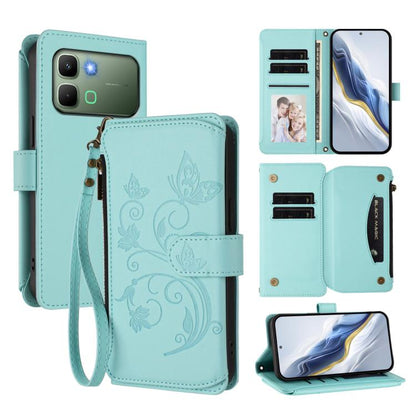 Mint green butterfly-pattern multi-card zipper wallet phone case with wrist strap.