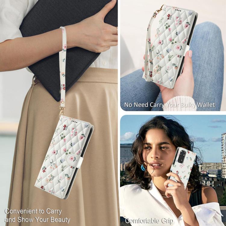 Floral leather phone case with wrist lanyard, showing quilted front cover