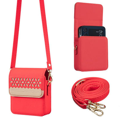 Red leather crossbody flip phone bag with cutout lace flap and adjustable strap