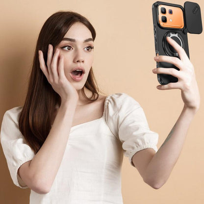 Rugged phone case with ring stand and sliding camera cover, held in hand