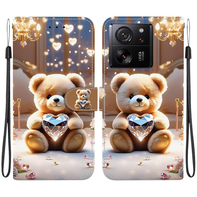 Leather-style phone case with teddy bear holding diamond heart; camera cutout; wrist strap.