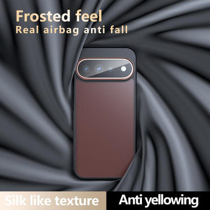 Dark maroon phone case with frosted matte finish and raised camera bumper