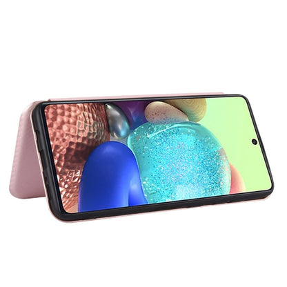 Pink magnetic flip phone case with carbon-fiber texture, horizontal kickstand view