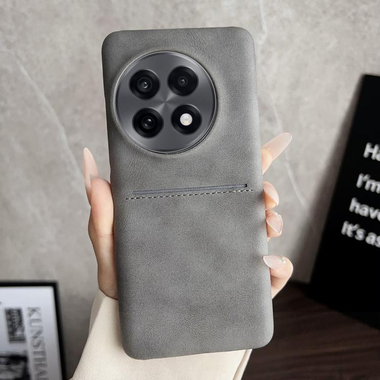 Grey sheepskin card slot phone case with stitched band and camera cutouts