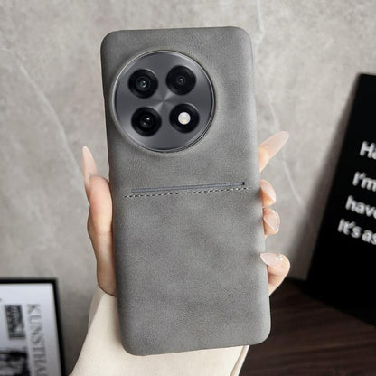 Grey sheepskin card slot phone case with stitched band and camera cutouts
