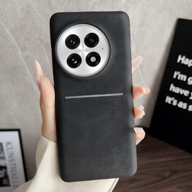 Black sheepskin card slot phone case with circular camera cutouts and stitched band