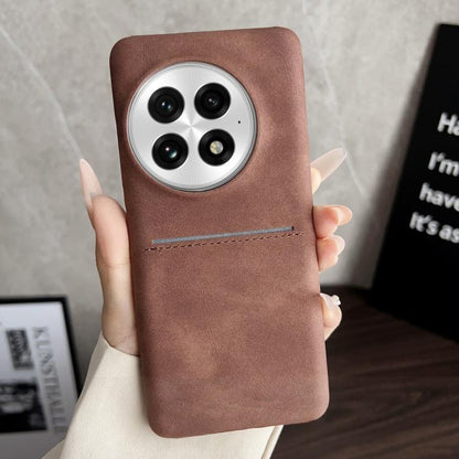 Brown sheepskin card slot phone case with circular camera cutouts and stitched band