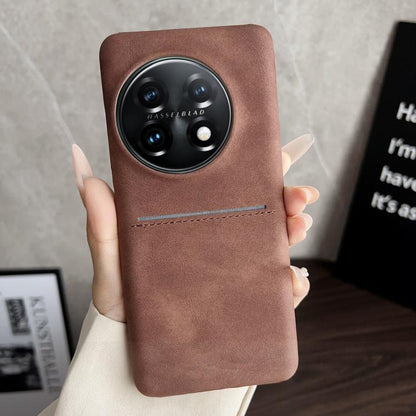 Brown leather-style phone case with card slot and camera cutout.