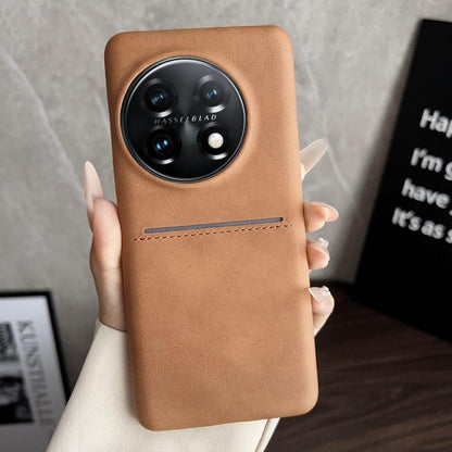 Tan leather-style phone case with card slot and camera cutout.